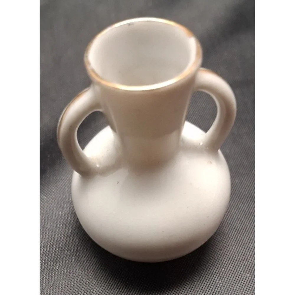 Collection of Seven Vintage Miniature Ceramic Bud Vases with Hand-Painted Design